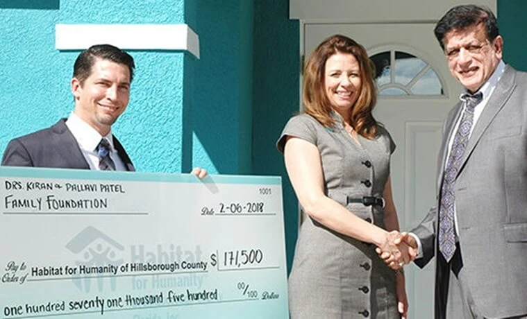 Indian American Dr. Kiran Patel Donates $171,500 to Humanity for Habitat of Hillsborough Country to Build Homes for Low-income Families Dr. Kiran Patel news, Kiran Patel Foundation donations, Humanity for Habitat Hillsborough County, Florida Indians